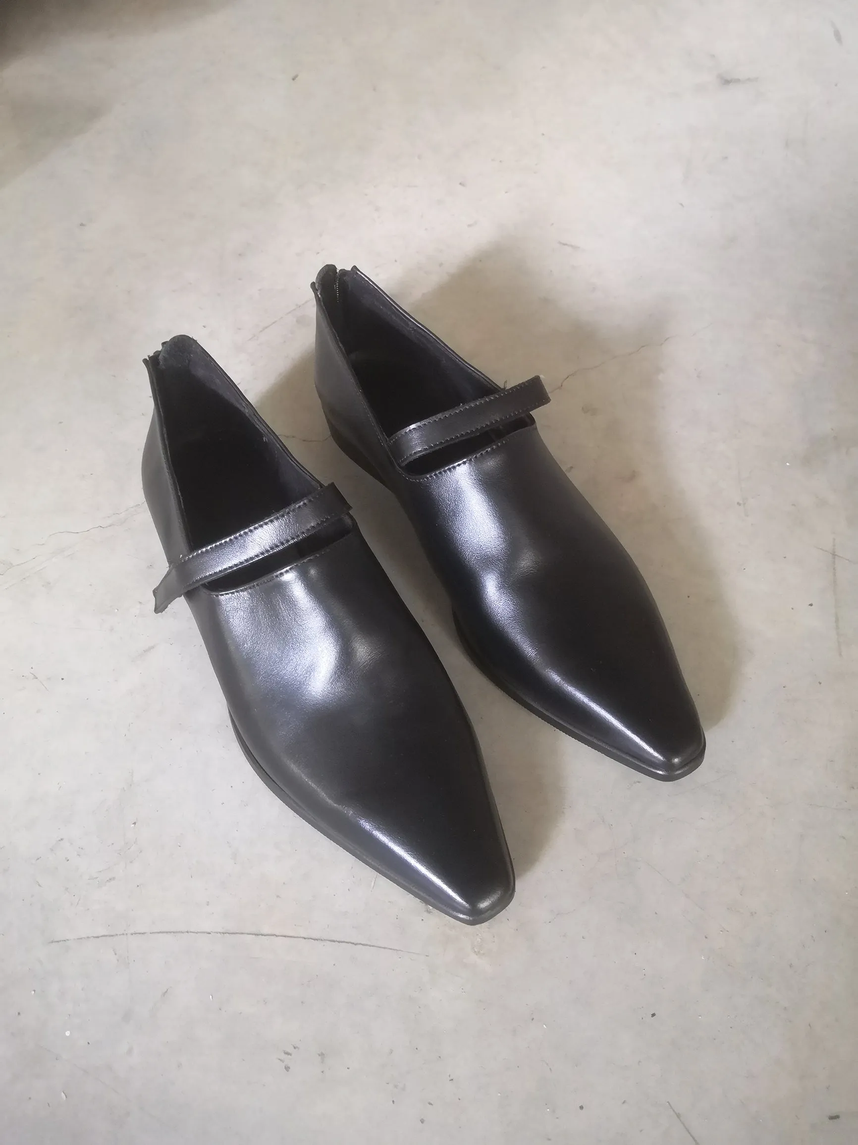 Hand Carved Shoes In Black